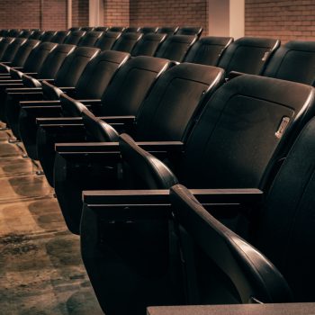 numbered-seats-in-an-empty-theatre-theater-2022-11-07-05-47-56-utc (1)
